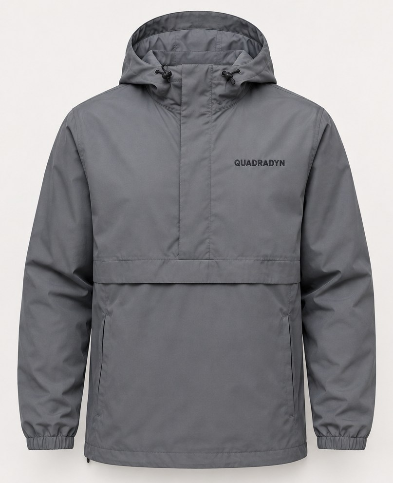 Quadradyn Tech Windbreaker in grey, front view with QUADRADYN on the left chest